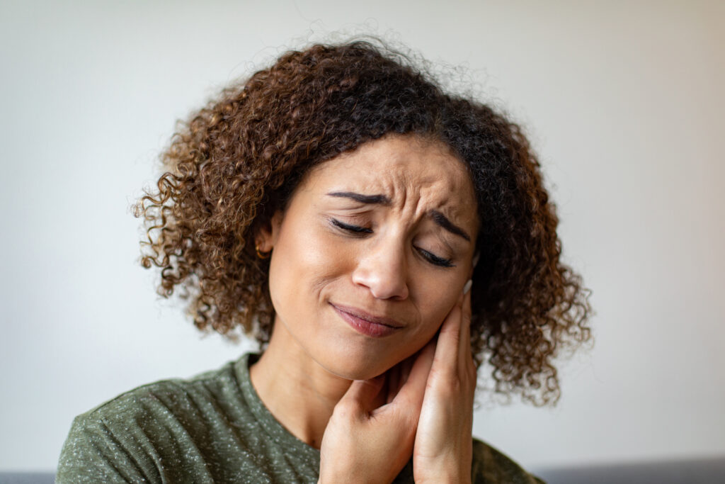 Veteran experiencing ear pain and discomfort from tinnitus, a common service-connected VA disability